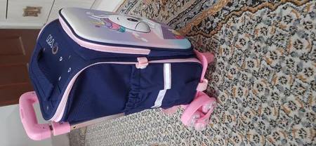 کوله پشتی چرخ دار مدل اسب تک شاخ عکس برجسته