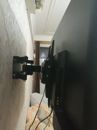 پایه دیواری تلویزیون ال جی مدل F830 مناسب برای تلویزیون های 40 تا 60 اینچ