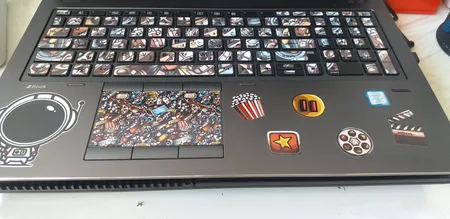 استیکر لپ تاپ راتیانا مدل cinema01 مناسب برای لپ تاپ 15 تا 17 اینچ به همراه برچسب حروف فارسی کیبورد