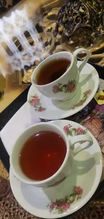 ست فنجان و نعلبکی 12 پارچه مدل گل سرخی