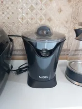 تجریه خرید آب مرکبات گیری میگل مدل GCS 85