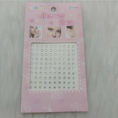 پیرسینگ بینی زنانه مدل چسبی طرح الماس کد nos110 بسته 100 عددی