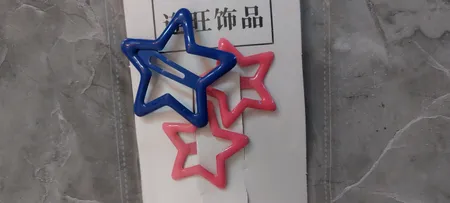 گیره مو دخترانه مدل تق تقی ستاره ای پاستیلی بسته 10 عددی