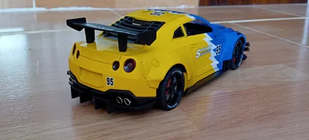 ماشین بازی چه ژی مدل نیسان طرح GTR موزیکال دودزا کد CZ128ADT