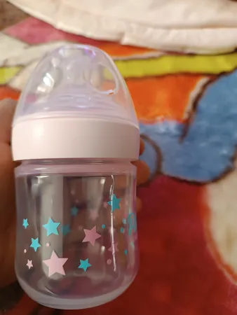 شیشه شیر پینو بیبی مدل Natural sense کد M 0-6 ظرفیت 150 میلی لیتر