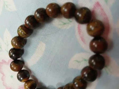 دستبند زنانه مدل سنگ چشم ببر کد 01