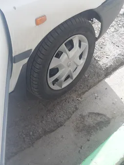 قالپاق چرخ تی پی ای مدل ساینایی کد TPA-PS04 سایز 13 اینچ مناسب برای پراید بسته 4 عددی