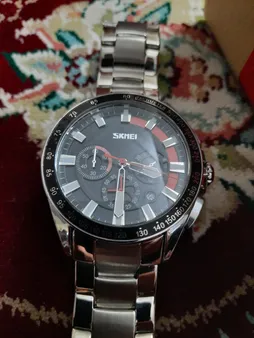 ساعت مچی عقربه‌ای کوارتز مردانه اسکمی مدل 9167 OG