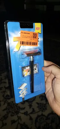 خود تراش مردانه ژیلت مدل 7o CLOCK به همراه یک عدد تیغ یدک