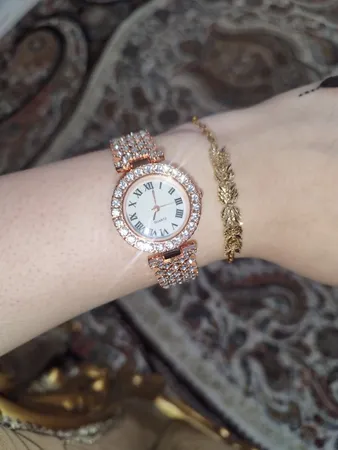 ساعت مچی عقربه ای زنانه مدل دستبندی نگین دار کد 02