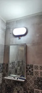 تجریه خرید چراغ استخری دیواری پرتو درخشان مدل واترپروف IP65 طرح روکار بیضی