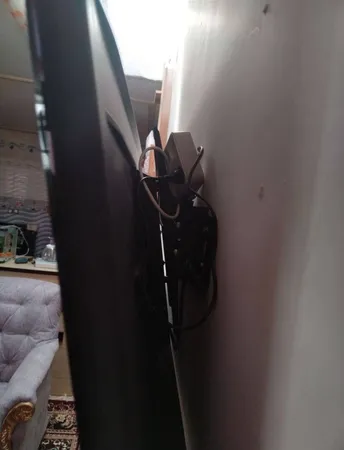 پایه دیواری تلویزیون  مدل T-J300 مناسب تلویزیون های 32 تا 65 اینچ