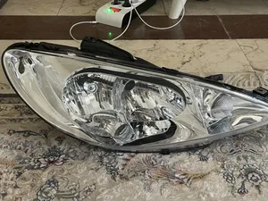 تجریه خرید چراغ جلو گروه پژوهش صنعت مدرن کد 0a65 مناسب برای پژو 206 بسته دو عددی