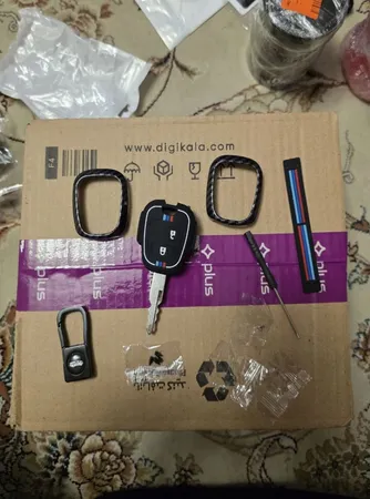 کاور ریموت و سوئیچ خودرو ام آر جی مدل A1074طرح فلز کربن مناسب برای پژو 207