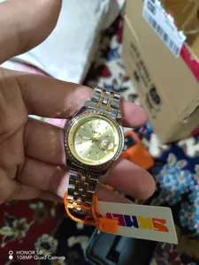 تجریه خرید ست ساعت مچی عقربه ای زنانه و مردانه اسکمی مدل 9098 کد 01