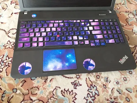 استیکر لپ تاپ کد uni-corn01 به همراه برچسب حروف فارسی کیبورد