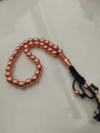 تسبیح مدل مسی دانه درشت 33 تایی 8 میلی