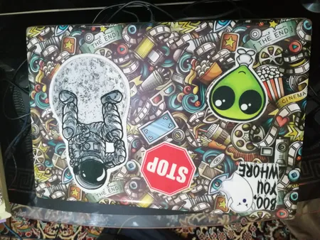 استیکر لپ تاپ راتیانا مدل cinema01 مناسب برای لپ تاپ 15 تا 17 اینچ به همراه برچسب حروف فارسی کیبورد