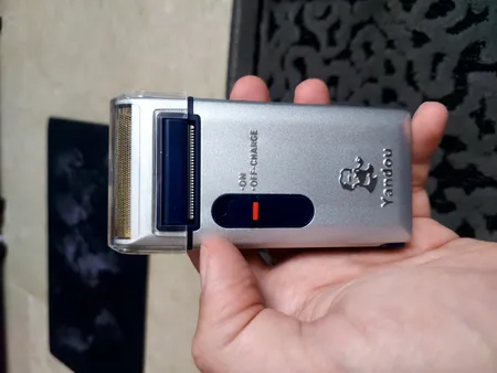 ماشین اصلاح موی صورت یاندو مدل Sv-w301u به همراه تیغه و توری یدک