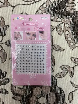 پیرسینگ بینی زنانه مدل چسبی طرح الماس کد nos110 بسته 100 عددی