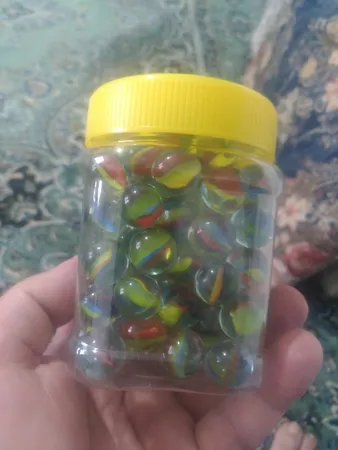 تیله شیشه ای مداد چوبی مدل چند پر بسته 100 عددی