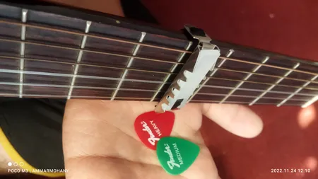 کاپو گیتار مدل بندی کد 7 همراه پیک مجموعه 2 عددی