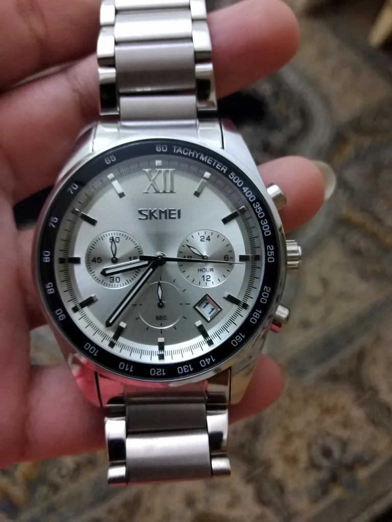 ساعت مچی عقربه ای مردانه اسکمی مدل 9096sl