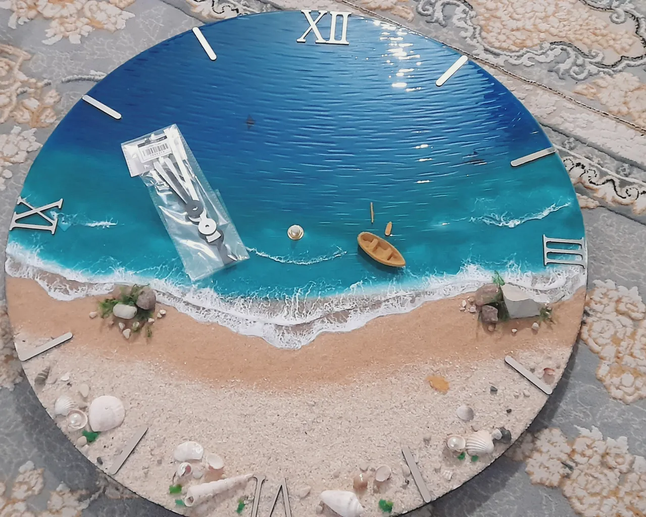ساعت دیواری رزینی طرح ساحل و دریا