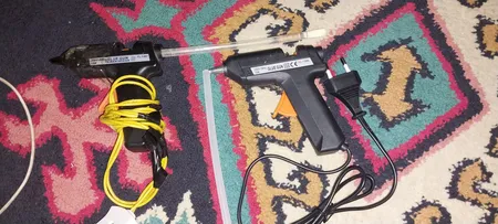 دستگاه چسب تفنگی جانسون مدل FL-138B به همراه یک عدد چسب حرارتی جانسون بصورت رایگان