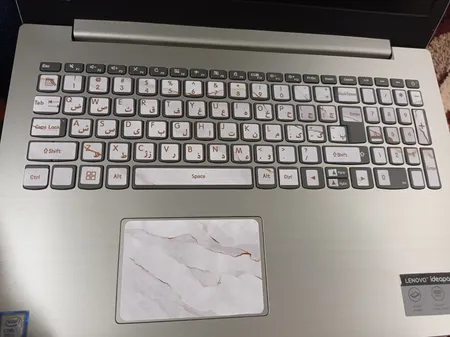 استیکر لپ تاپ مدل marble کد03 مناسب برای لپ تاپ 15 تا 17 اینچی به همراه برچسب حروف فارسی کیبورد