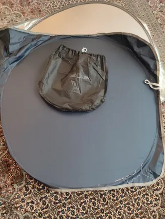 آفتابگیر شیشه جلو خودرو مدل عینکی به همراه کاور نگهدارنده