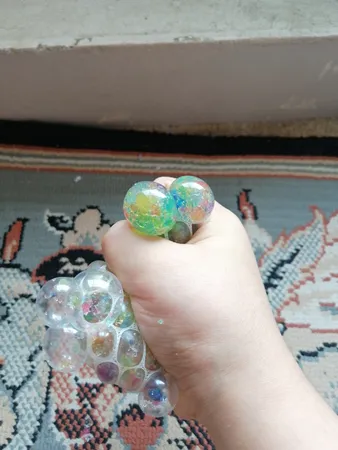 توپ بازی ضد استرس مدل Gel Bullets White Mesh Squish Ball