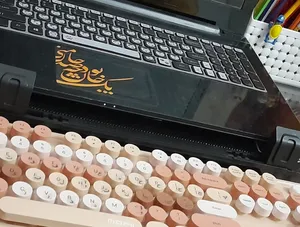 تجریه خرید استیکر لپ تاپ توییجین و موییجین طرح شعر فارسی کد 04 مناسب برای لپ تاپ 15.6 اینچ به همراه برچسب حروف فارسی کیبورد