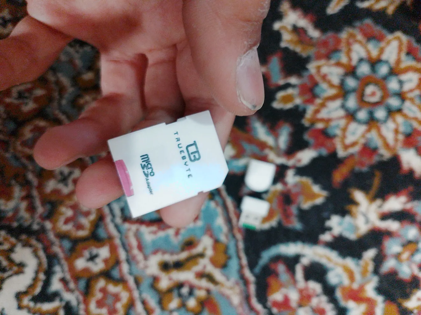 کارت حافظه microSDXC تروبایت مدل 633X-A2-V30 کلاس 10 استاندارد UHS-I U3 سرعت 95MBps ظرفیت 64 گیگابایت به همراه کارت‌خوان