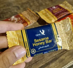 تجریه خرید کنجد عسلی پذیرایی عقاب 10 گرم بسته 32 عددی