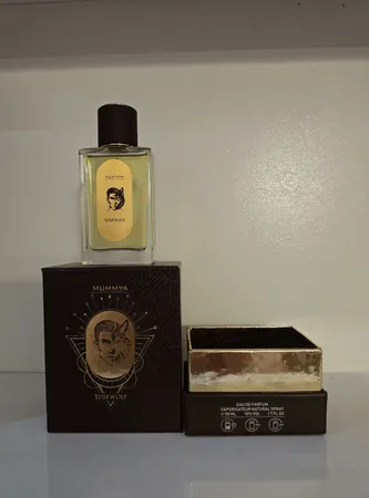 ادو پرفیوم مردانه مومیا مدل تام ولف کهربا با رایحه تلخ و گرم حجم 50 میلی لیتر