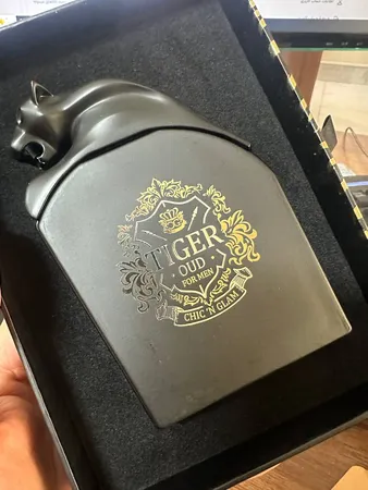 ادو پرفیوم مردانه چیکن گلم مدل Tiger Oud با رایحه گرم حجم 100 میلی لیتر