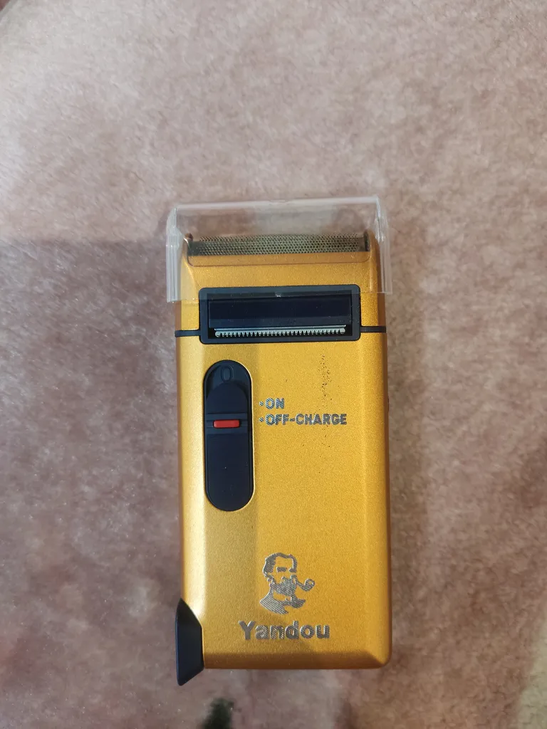 ماشین اصلاح موی صورت یاندو مدل SV-316U به همراه تیغه و توری یدک