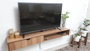 تجریه خرید میز تلویزیون دیواری مدل DLF86L