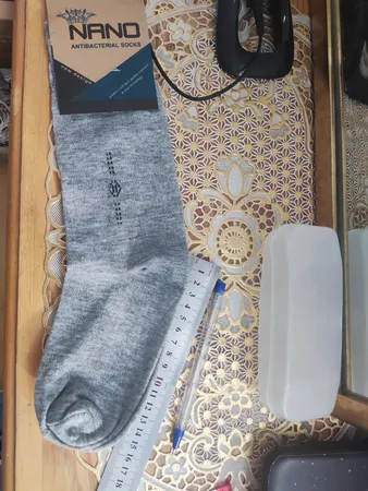 جوراب مردانه مدل نانو پنبه ساق بلند بسته 12 عددی