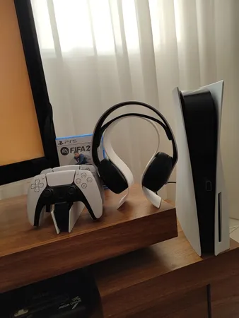 کنسول بازی سونی مدل PlayStation 5 ظرفیت 825 گیگابایت ریجن 1200 آسیا به همراه دسته اضافی و پایه شارژر و هدست