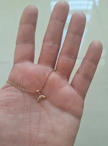 تجریه خرید آویز گردنبند طلا 18 عیار زنانه ناریا طرح دم وال کد SH5