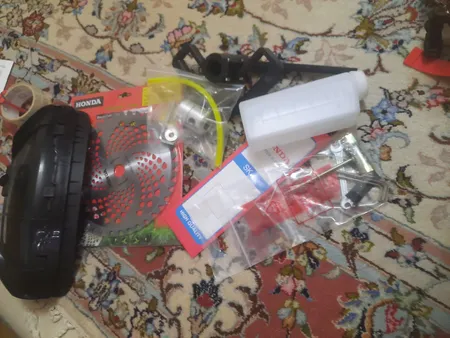 علف  زن پشتی هندا مدل GX35 به همراه روتیواتور و تبدیل علف زن به اره