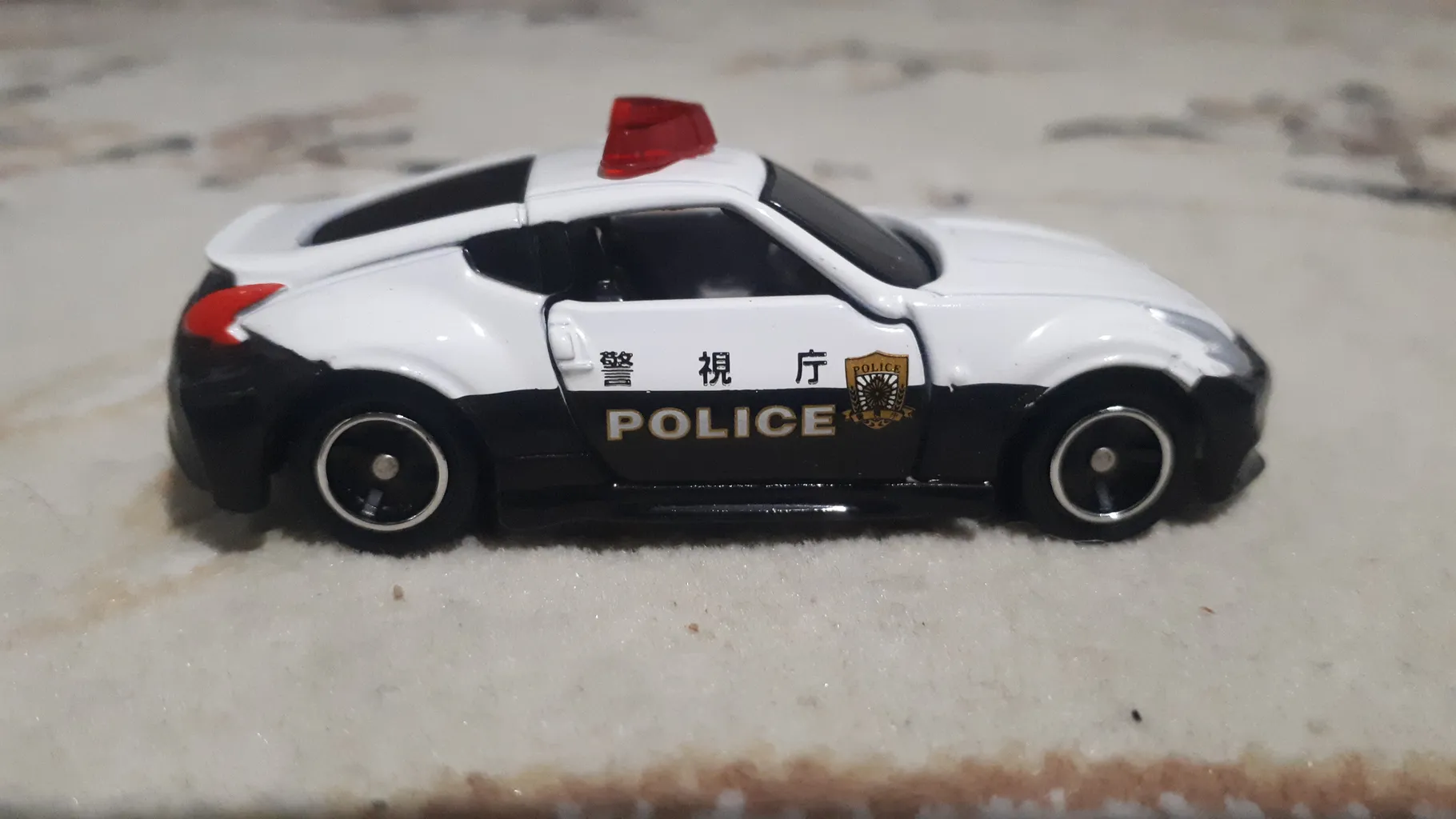 ماشین بازی تاکارا تامی مدل Nissan Fairlady Z Nismo Police Car کد 859963