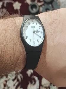 تجریه خرید ساعت مچی عقربه ای زنانه و مردانه کیو اند کیو مدل A212J003Y