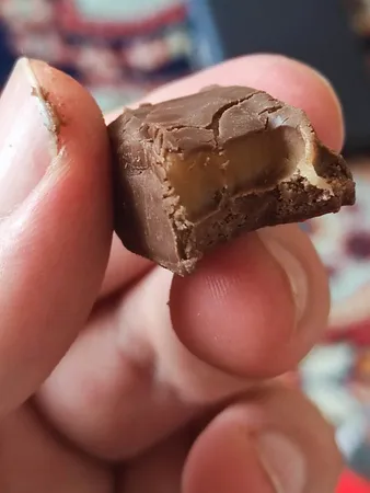 شکلات مغز دار نانی شیرین عسل -800 گرم بسته 100 عددی