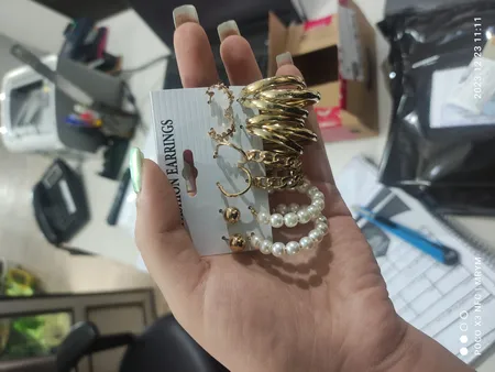 گوشواره زنانه مدل حلقه ای طنابی بسته 12 عددی