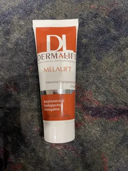 کرم روشن کننده صورت درمالیفت مدل Melalift مناسب انواع پوست حجم 40 میلی لیتر