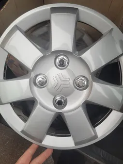 قالپاق چرخ ابویی مدل rioprid1 سایز 13 اینچ مناسب برای پراید مجموعه 4 عددی