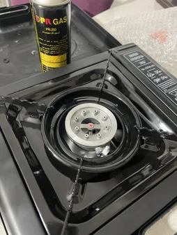 اجاق سفری مدل AS به همراه دو عدد کپسول گاز سفری